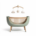 Modern wooden crib with removable mobile in soft green finish 90 x 60 x 80cm